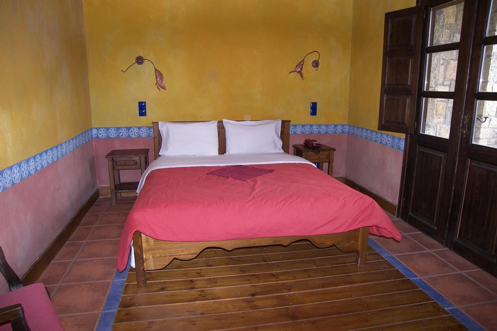Astrovolia Hotel กาลัมปากา ห้อง รูปภาพ